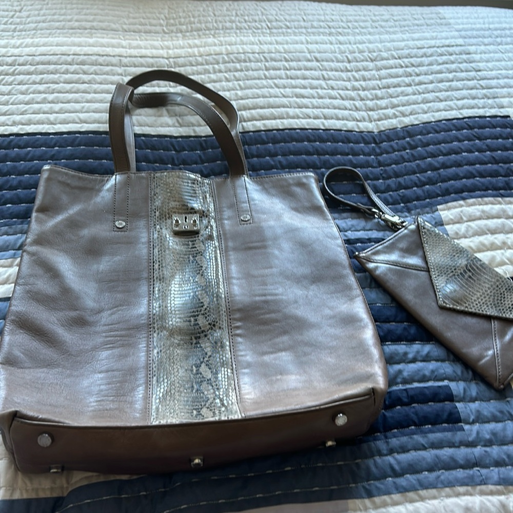Danier leather bag in a taupe color.